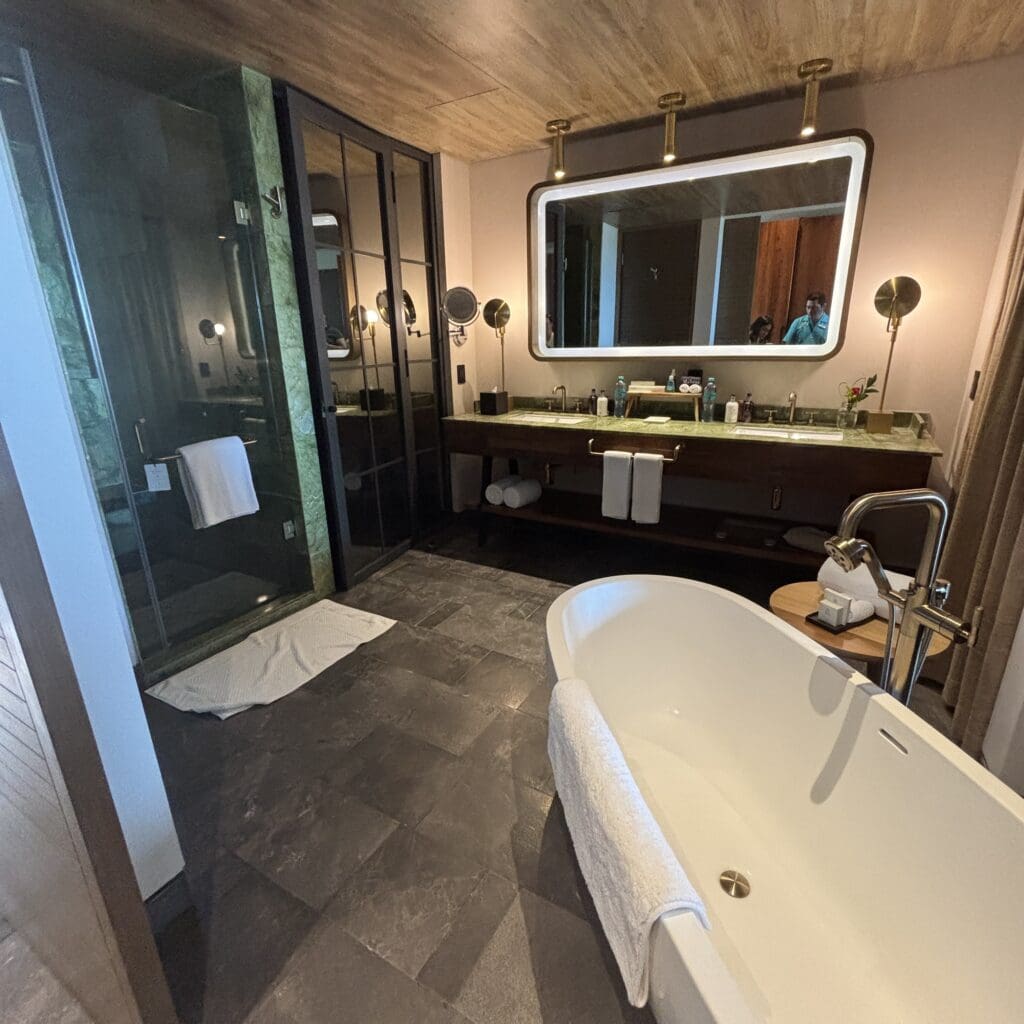 bathroom that features a stand alone tub